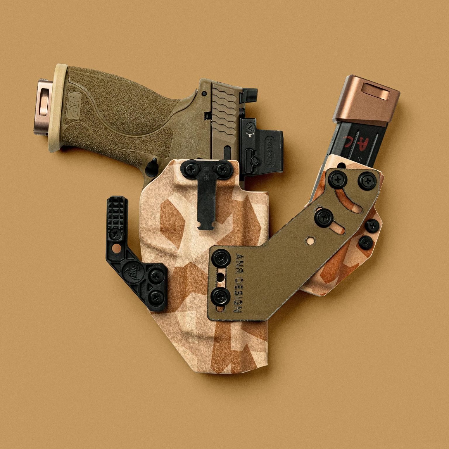 Smith & Wesson M&P 2.0 5"Daisho holster in Swedish M90 Desert with carbon fiber bridge.